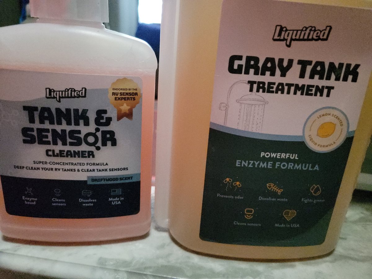 Biscuit's Liquified tank treatment bottles from Prime RV